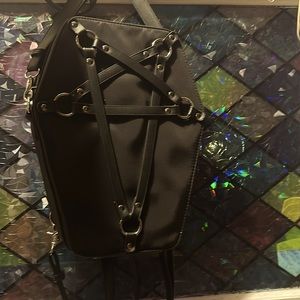 Convertible coffin backpack